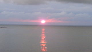 ペンション深浦からの夕日の写真